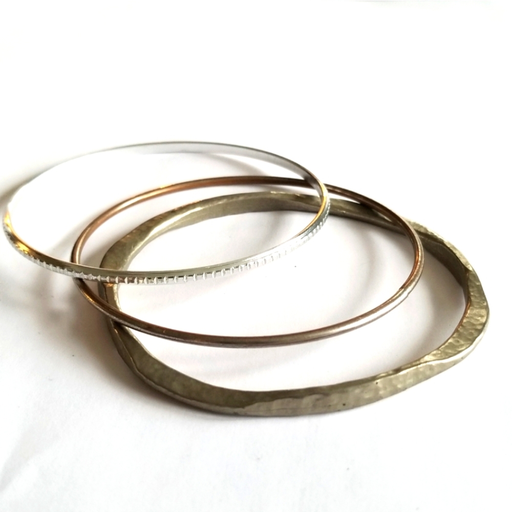 Three vintage bangle bracelets silver tone